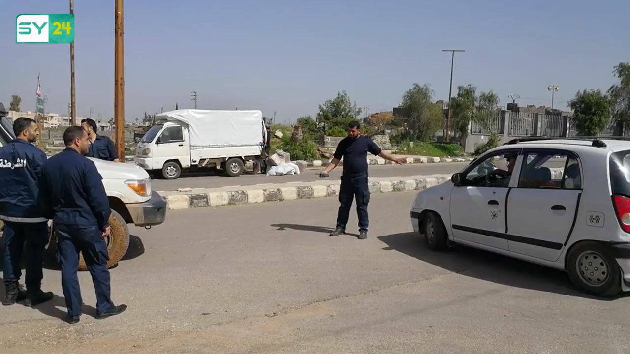 الشرطة الحرة تقوم بتنظيم وتأمين عملية توزيع الإغاثة في درعا