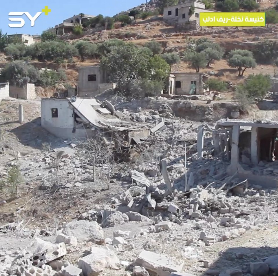جرحى جراء إلقاء طيران النظام المروحي 3 براميل متفجرة على قرية كنيسة نخلة بريف مدينة جسر الشغور غرب إدلب