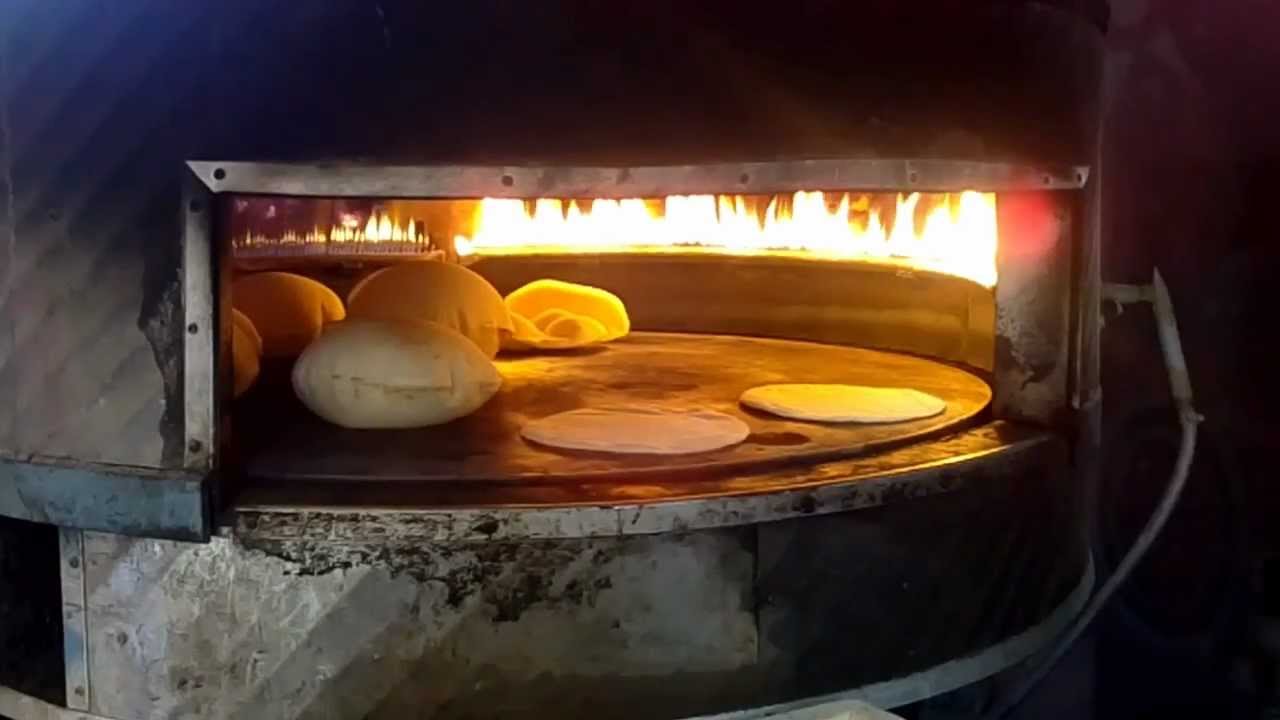 إيران تضع يدها على “رغيف الخبز” السوري.. من بوابة الاستحواذ على المطاحن والصوامع